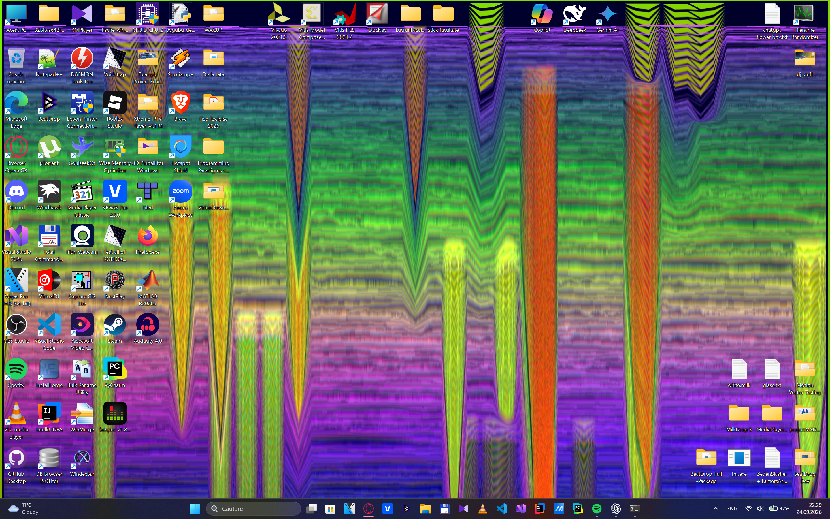 BeatDrop's animated visualizer running behind Windows desktop icons